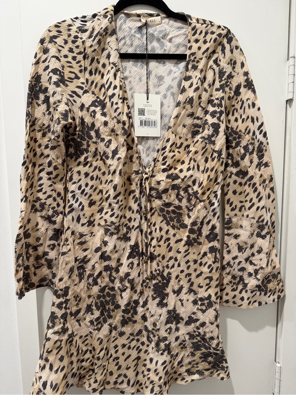 Brand NEW Snow Leopard Bias Mini Dress